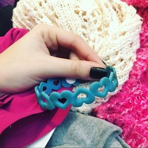 Blue heart bracelet.